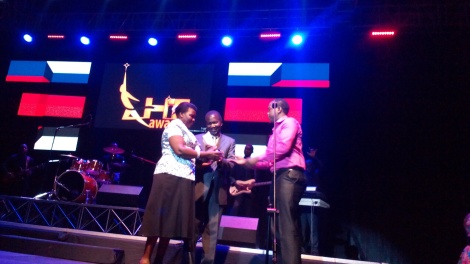 Pastor Franco Onaga Receiving Award on Behalf of Gary and Marilyn Skinner.